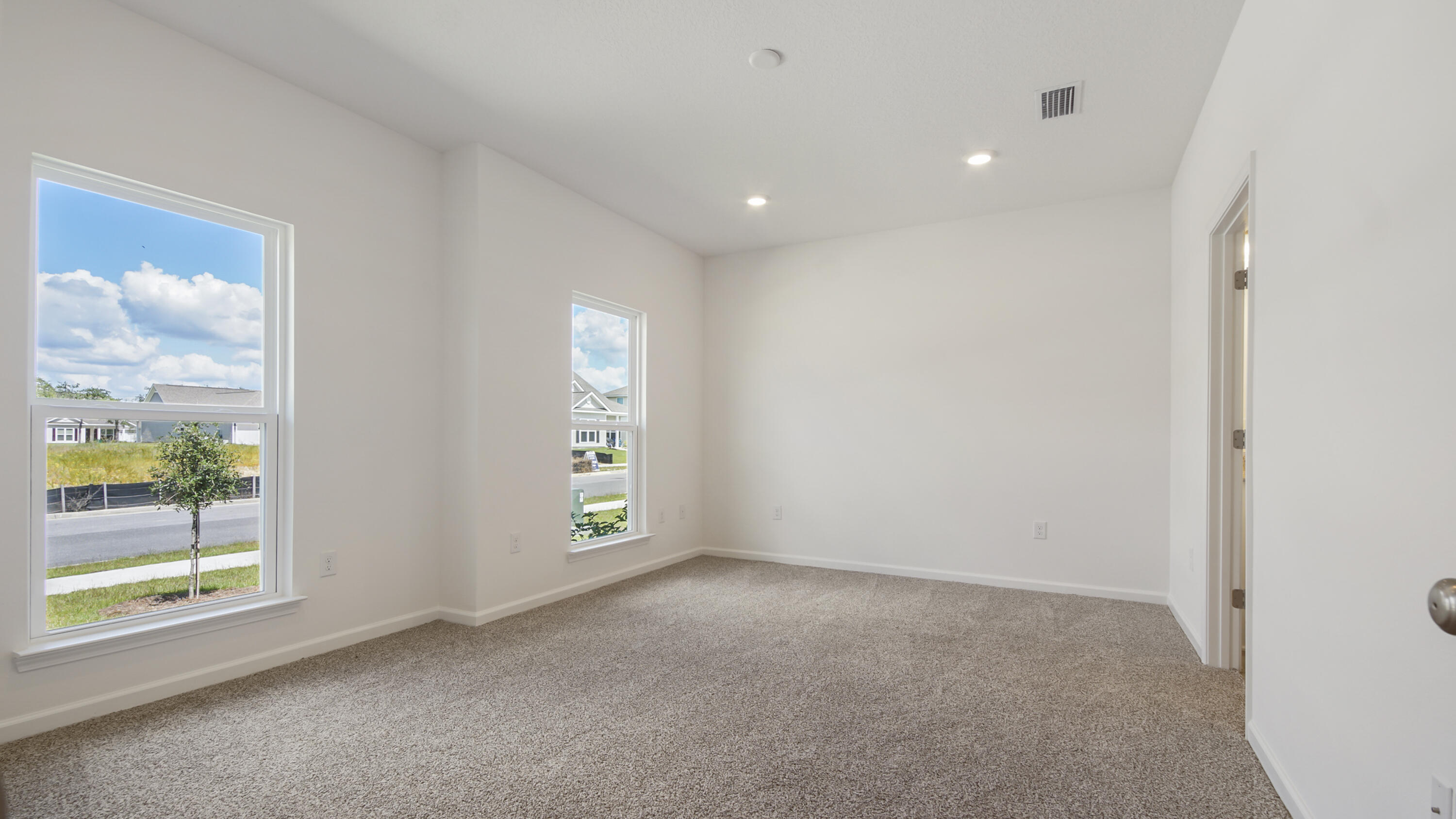 205 Huckleberry Street Freeport, FL 32439 - Photo 17 of 32 a view of an empty room with a window