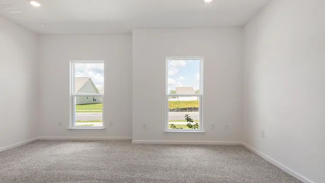 an empty room with windows