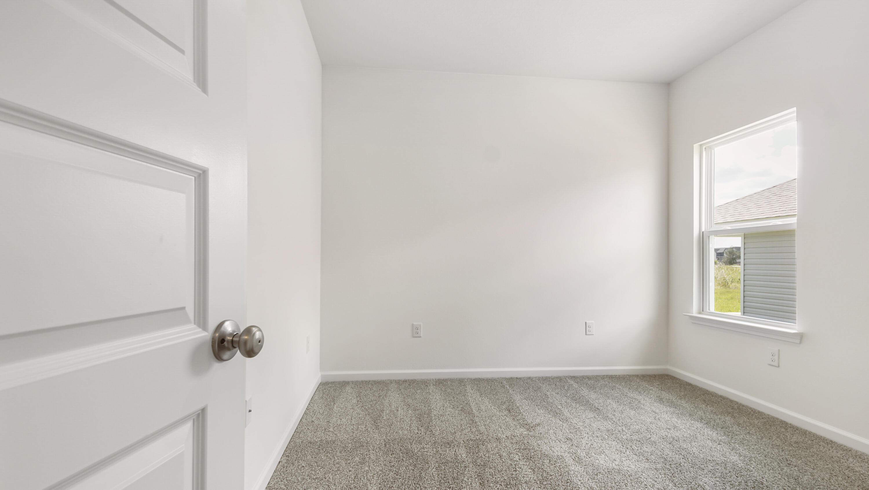 205 Huckleberry Street Freeport, FL 32439 - Photo 29 of 32 an empty room with a window