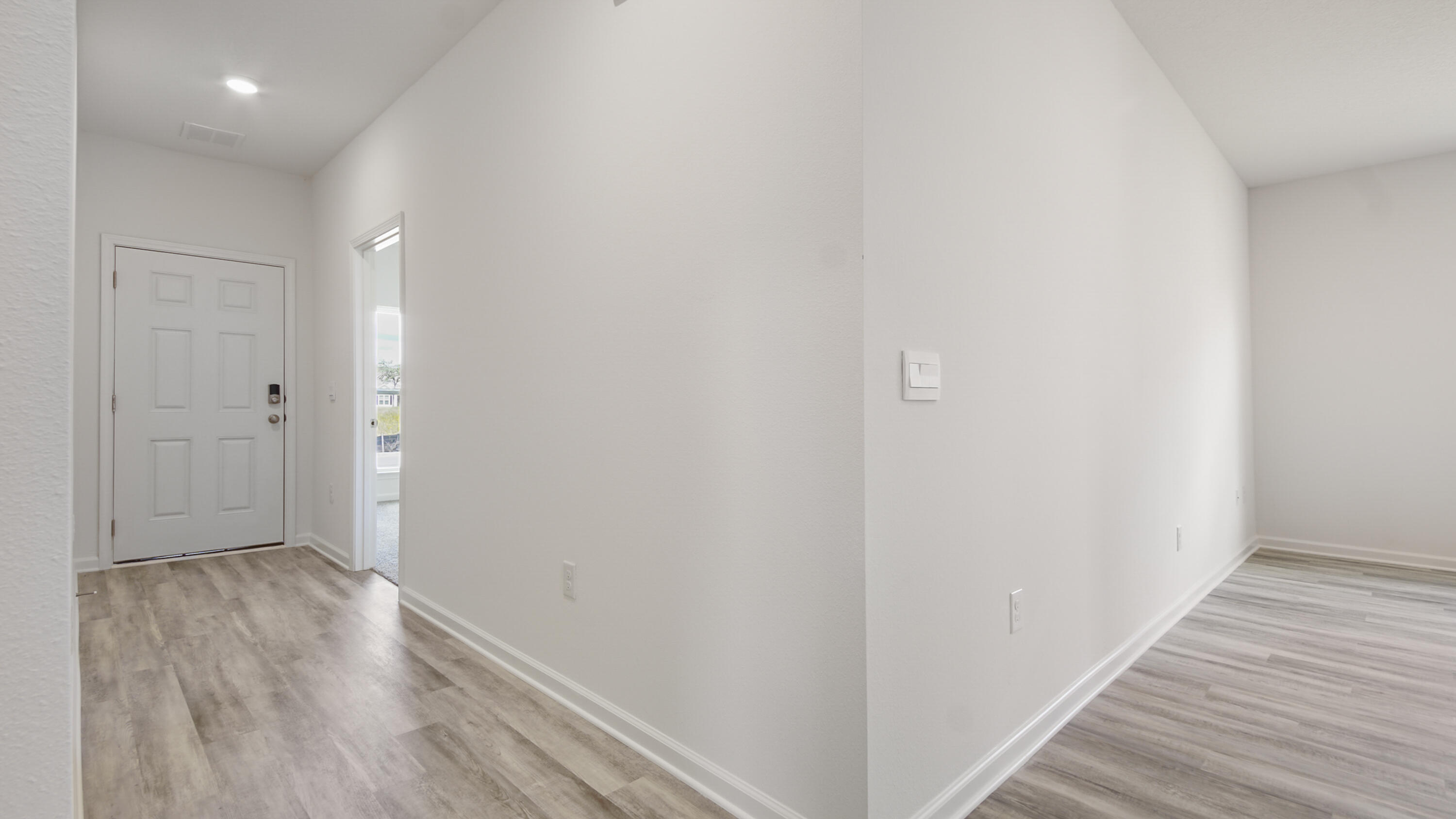 205 Huckleberry Street Freeport, FL 32439 - Photo 4 of 32 a view of hallway with wooden floor