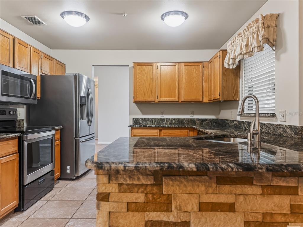 5017 Mill Stream Road Ocoee, FL 34761 - Photo 9 of 48