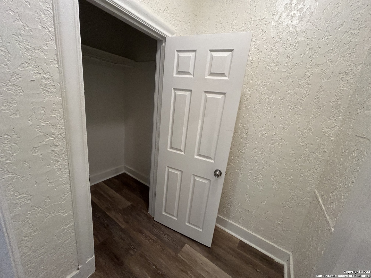 1625 McCullough Avenue, Unit 8 San Antonio, TX 78212 - Photo 5 of 5 an empty room with wooden floor