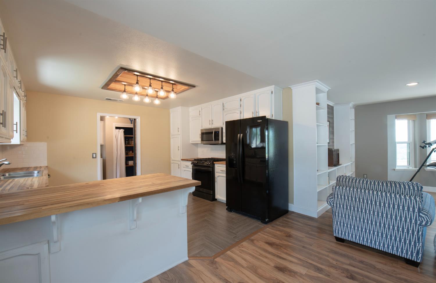 29395 Revis Road Coarsegold, CA 93614 - Photo 17 of 32 a kitchen with stainless steel appliances a refrigerator and a sink