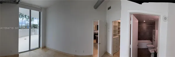 a view of a bathroom from a hallway