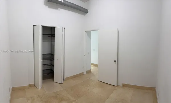 an empty room with closet
