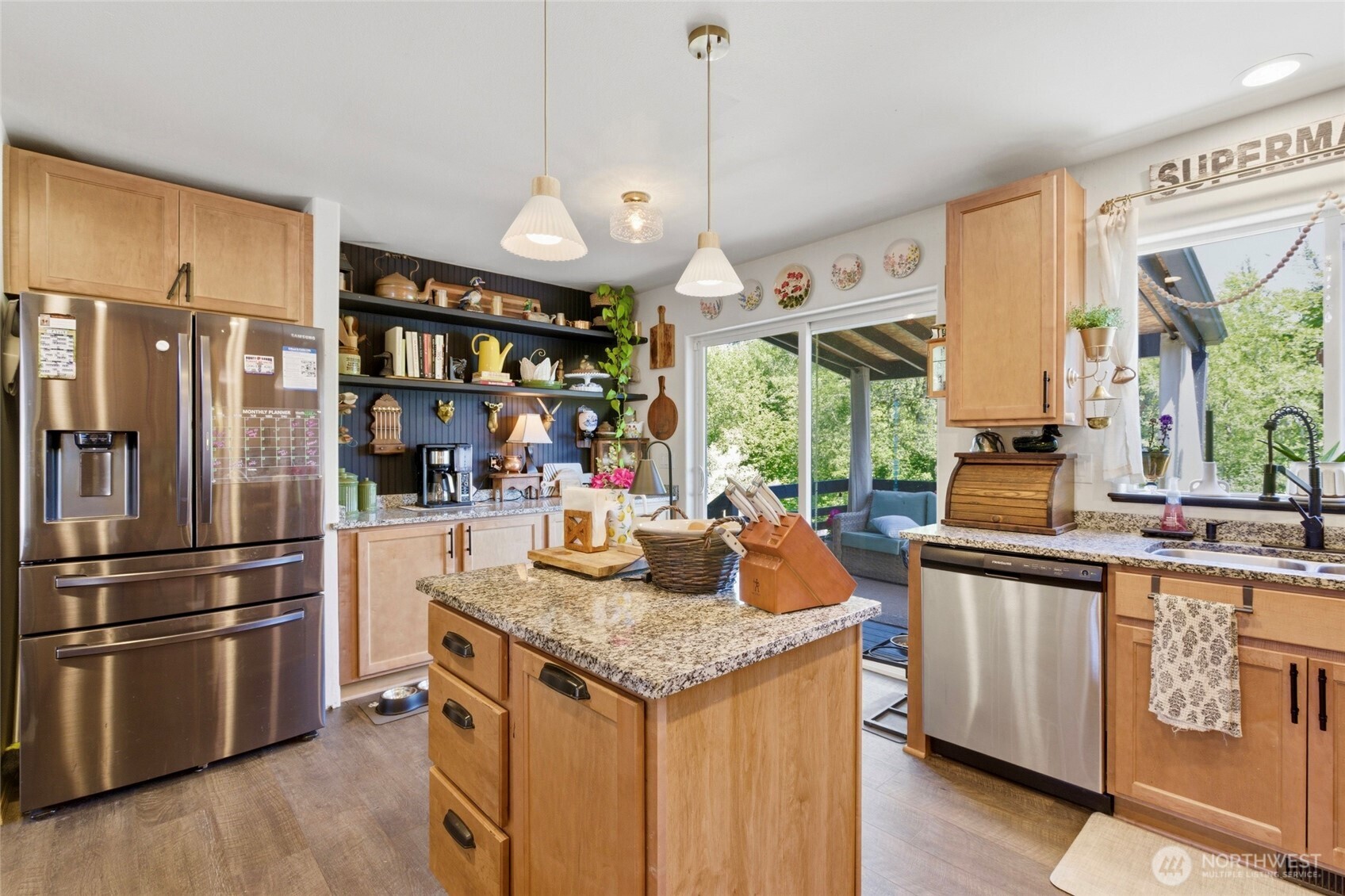 14005 Cedar Court Sultan, WA 98294 - Photo 10 of 38 a kitchen with stainless steel appliances granite countertop a stove and refrigerator