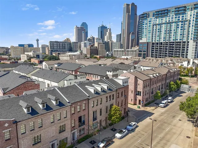 a view of a city with tall buildings
