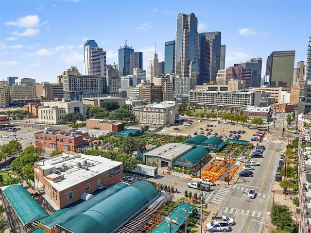 a view of a city with tall buildings