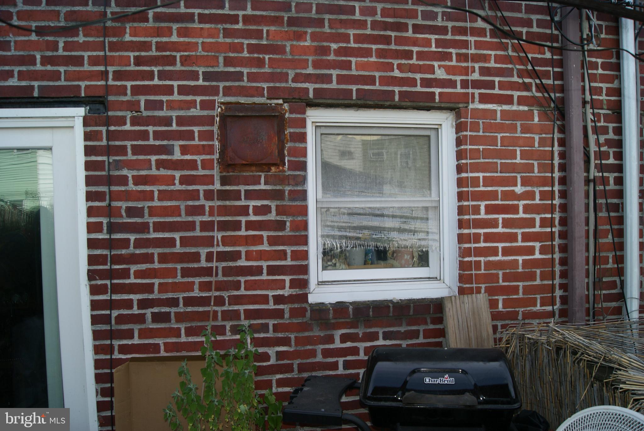 735 Grant Road Folcroft, PA 19032 - Photo 29 of 57 Charming brick facade with window view.