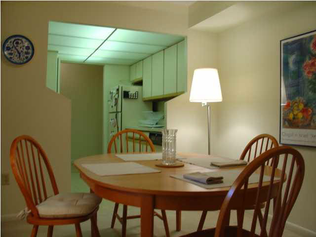 134 Turtle Creek Road, Unit 6 Charlottesville, VA 22901 - Photo 2 of 5 a view of a dining room with furniture and wooden floor
