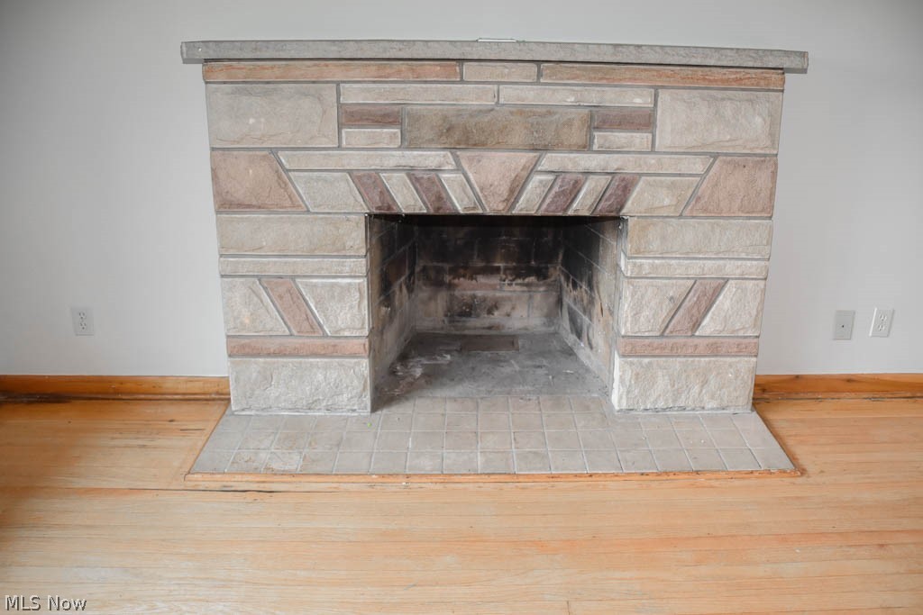 4640 Magnolia Road Northeast Canton, OH 44705 - Photo 15 of 28 Living room fireplace.