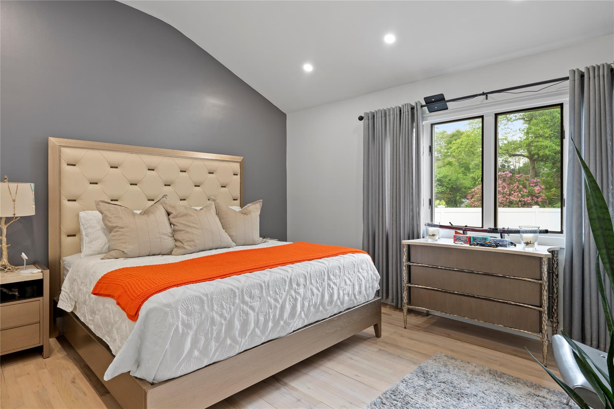 1 Bennett Avenue Huntington, NY 11746 - Photo 11 of 24 Bedroom featuring vaulted ceiling, light wood-type flooring, and recessed lighting