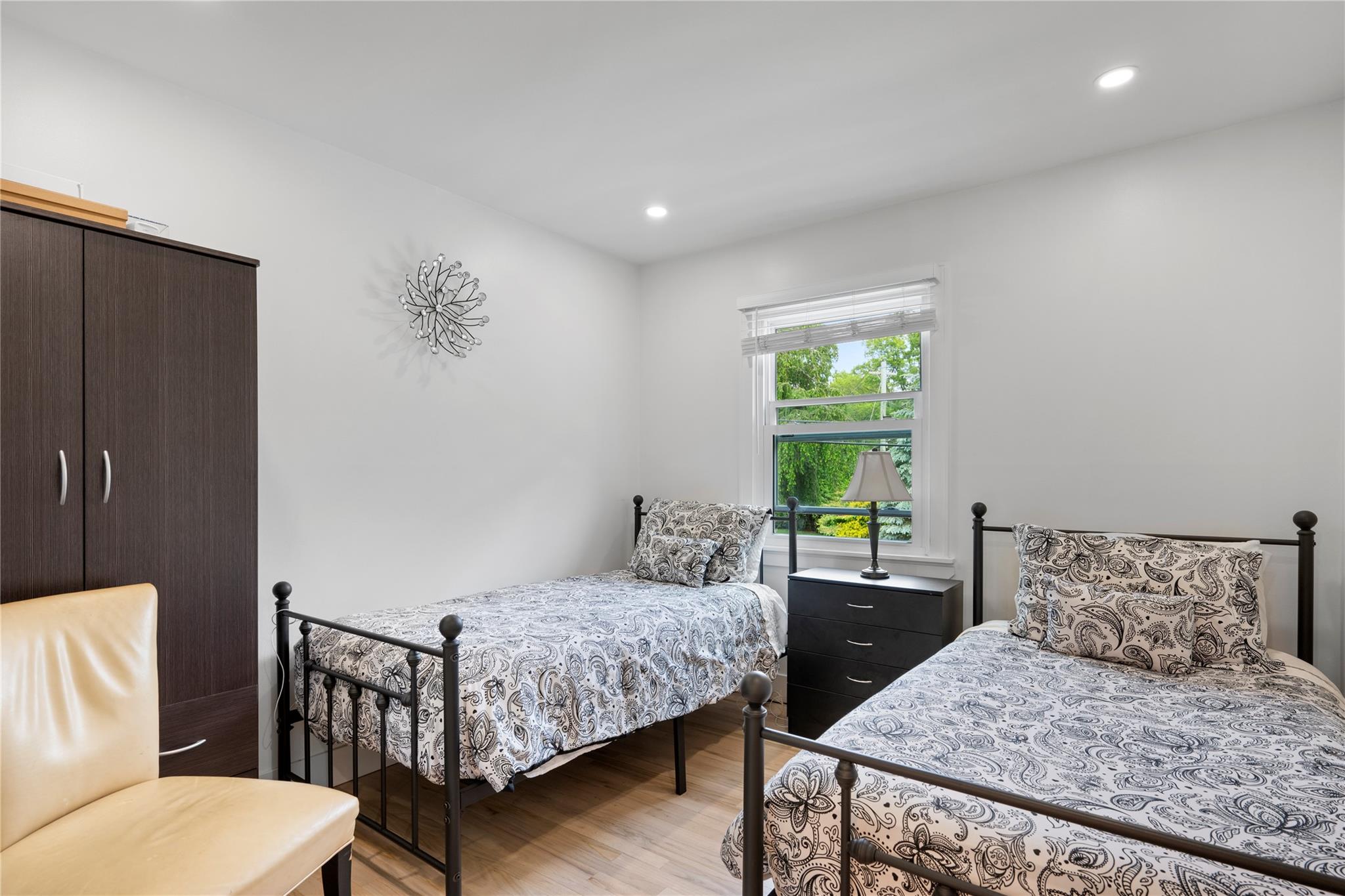 1 Bennett Avenue Huntington, NY 11746 - Photo 15 of 24 Bedroom with light wood finished floors and recessed lighting
