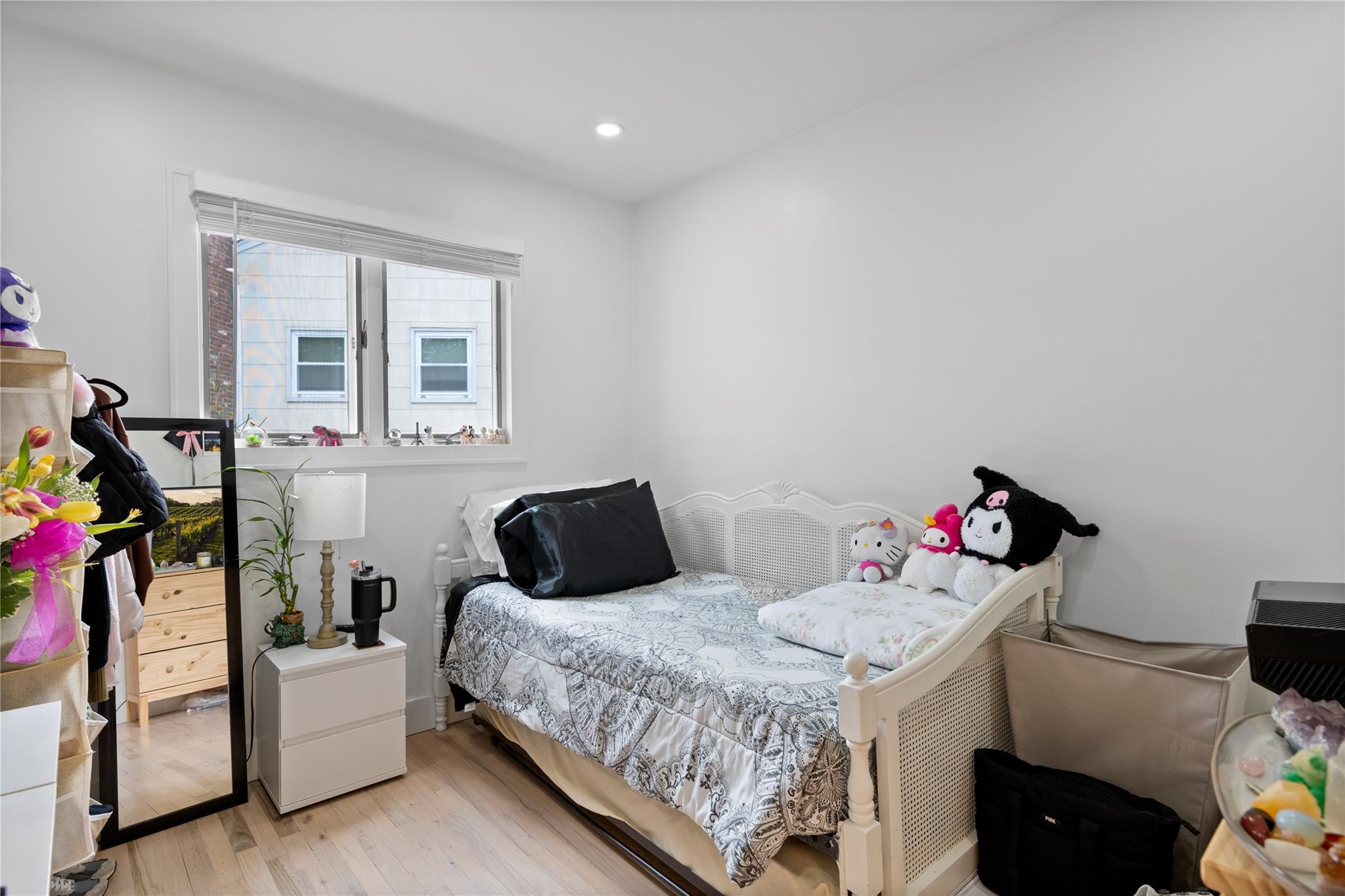 1 Bennett Avenue Huntington, NY 11746 - Photo 17 of 24 Bedroom featuring light wood-style floors and recessed lighting