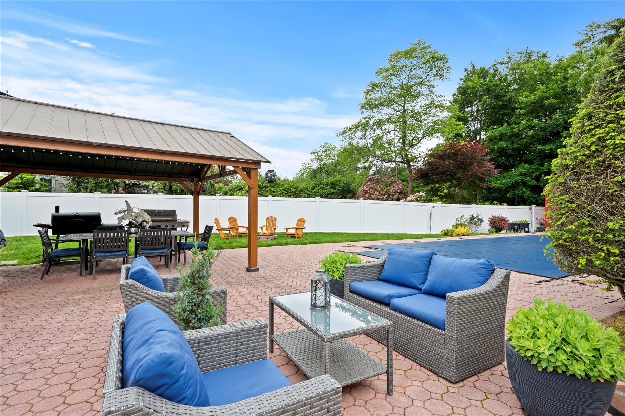 1 Bennett Avenue Huntington, NY 11746 - Photo 18 of 24 Fenced backyard featuring a gazebo, an outdoor hangout area, a patio area, outdoor dining area, and grilling area