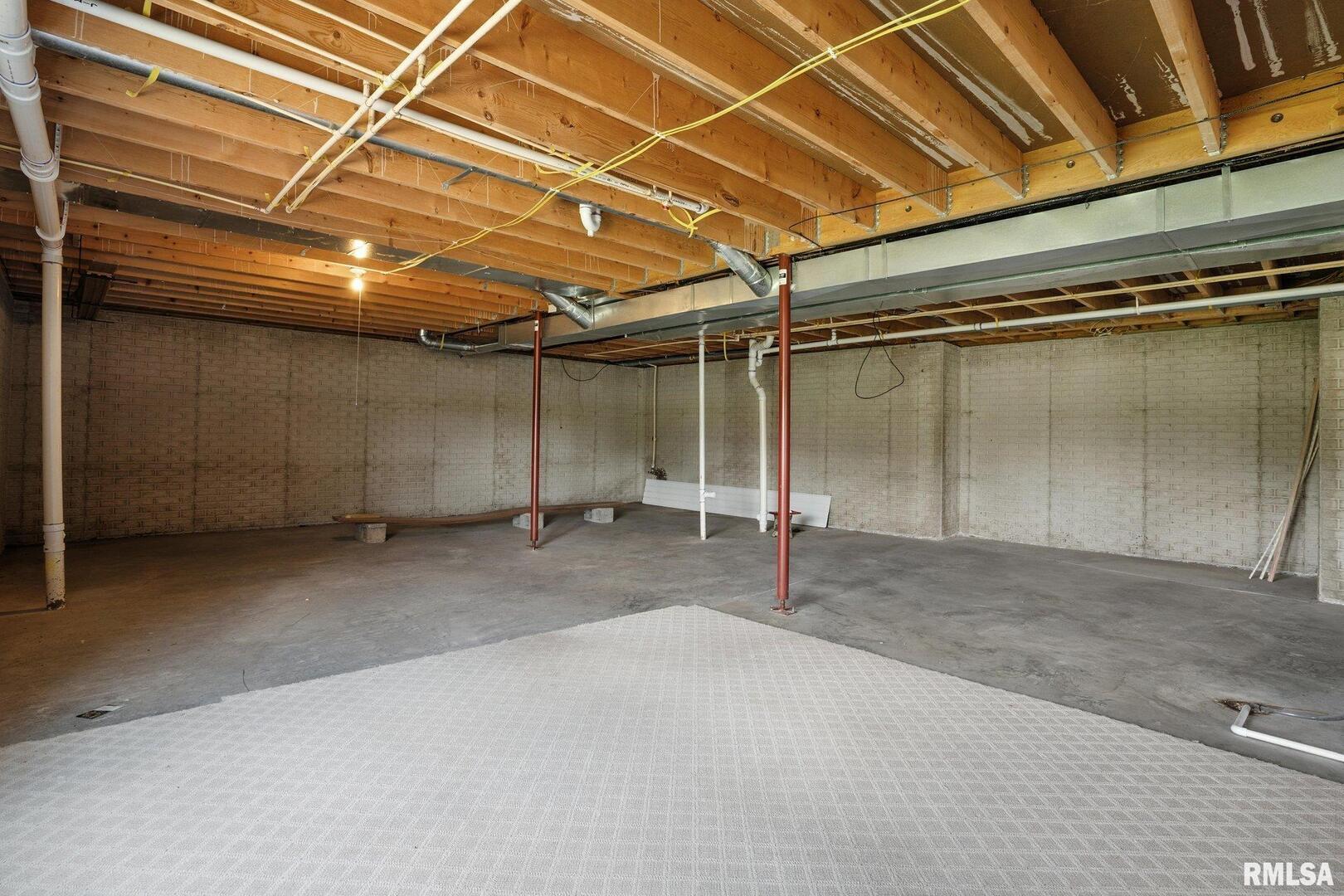 106 Valley View Drive Sherrard, IL 61281 - Photo 29 of 35 a view of a room with wooden walls