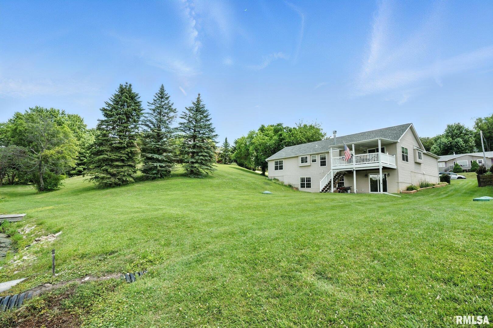 106 Valley View Drive Sherrard, IL 61281 - Photo 32 of 35 a house view with a garden space