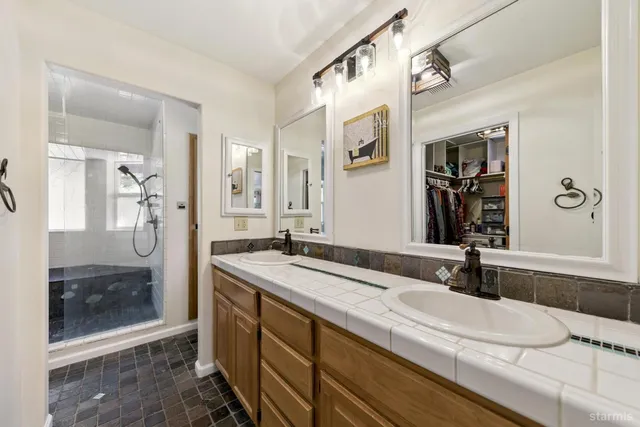 a bathroom with a sink and a mirror