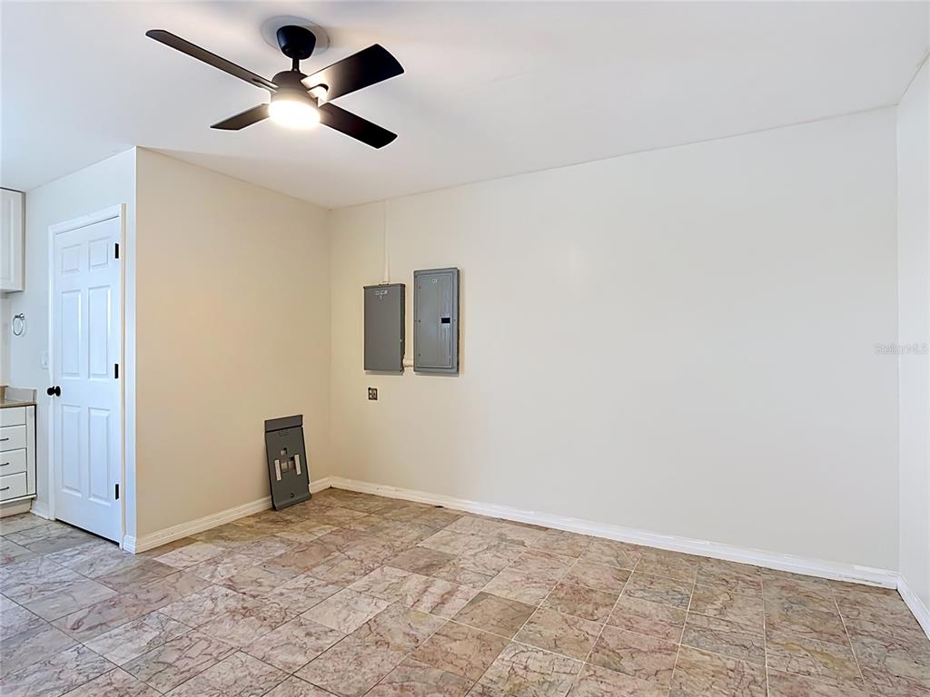 7925 Lake Mabel Loop Road Lake Wales, FL 33898 - Photo 68 of 97 an empty room with a empty space and ceiling fan