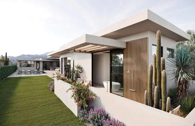 a front view of a house with yard patio and swimming pool