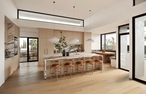 a view of a dining room with furniture and window