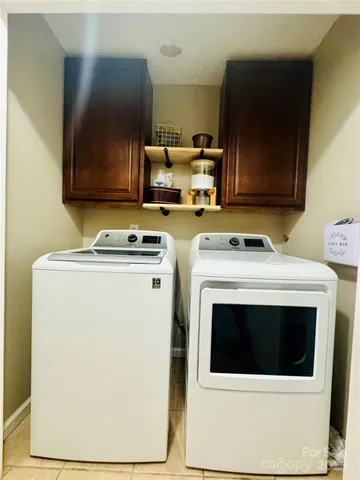 a utility room with washer and dryer