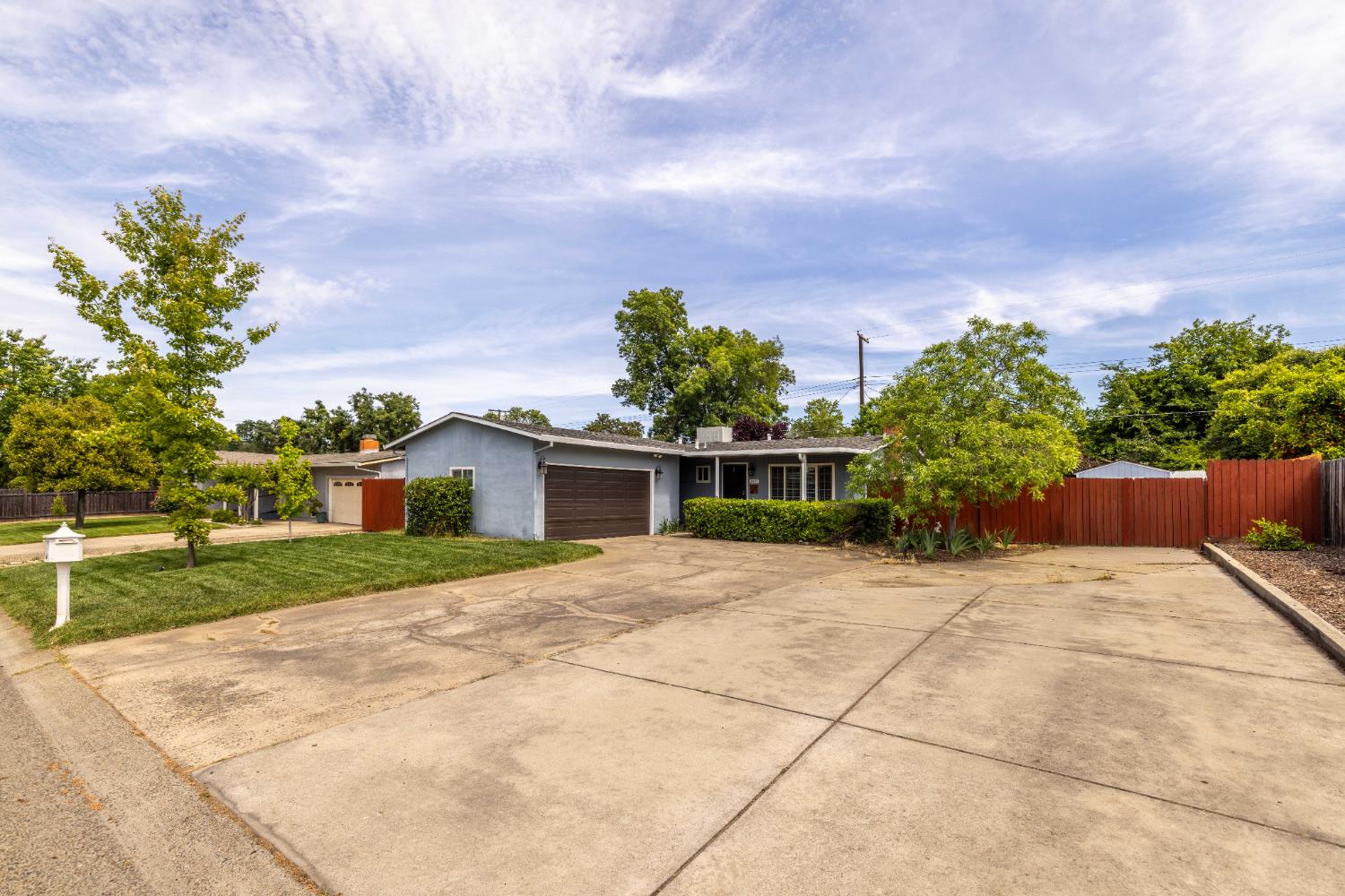 3832 Henderson Way Carmichael, CA 95608 - Photo 1 of 28 RVs, boats, extra cars - there's a LOT of room in this driveway, behind the gate at the back of the driveway, and on the other side of the front yard, which has tire tracks for additional parking.