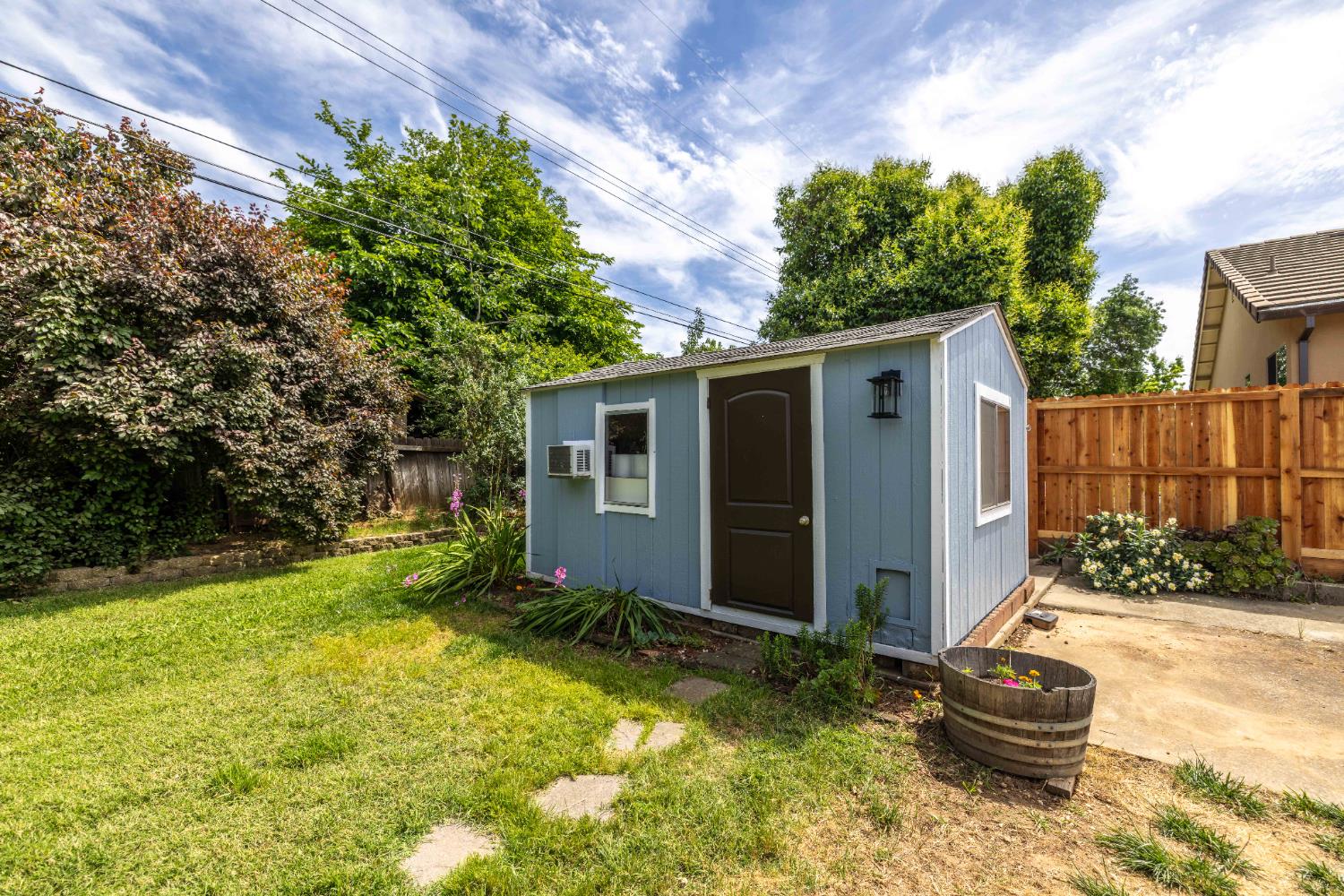 3832 Henderson Way Carmichael, CA 95608 - Photo 12 of 28 Lighting, an AC unit and a finished interior give you so many possibilities for this shed.
