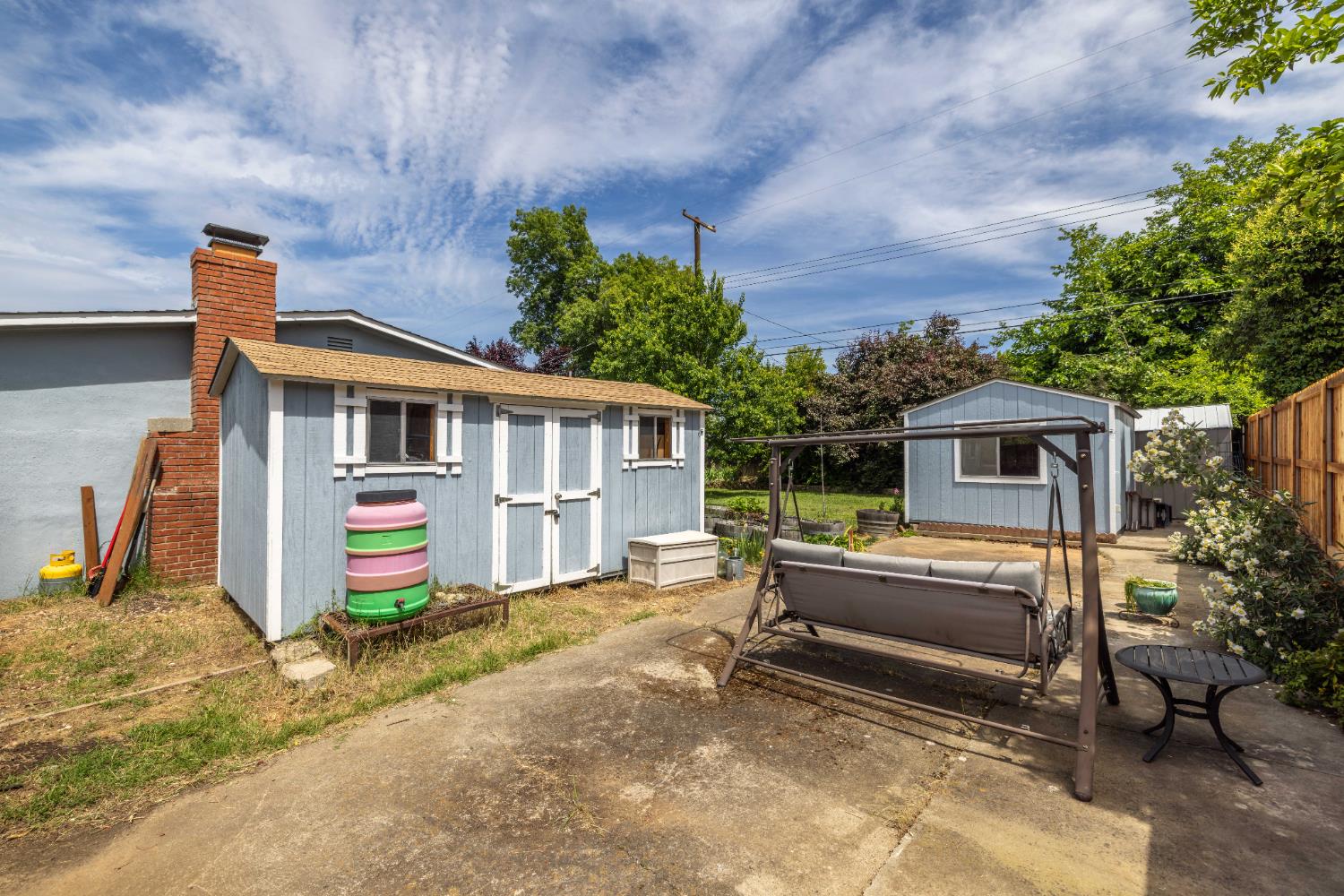 3832 Henderson Way Carmichael, CA 95608 - Photo 24 of 28 This area where the swing is behind the gate at the rear of the driveway could be used for gated RV, boat or car parking.