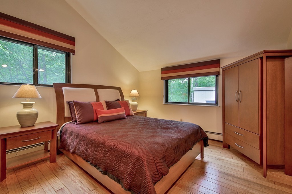 215 Littleton Road Harvard, MA 01451 - Photo 18 of 29 a bedroom with a bed and a window