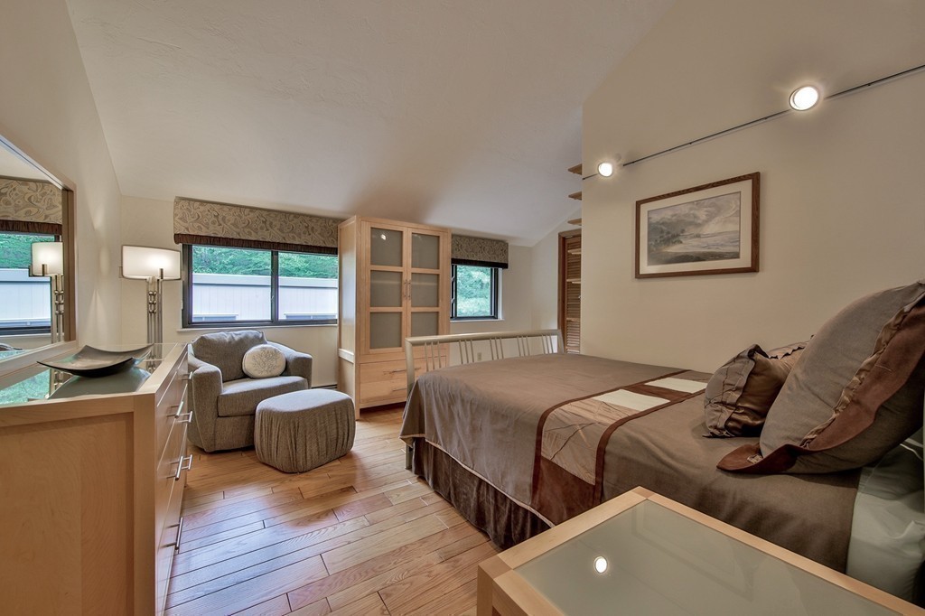 215 Littleton Road Harvard, MA 01451 - Photo 19 of 29 a bedroom with two beds and a couch