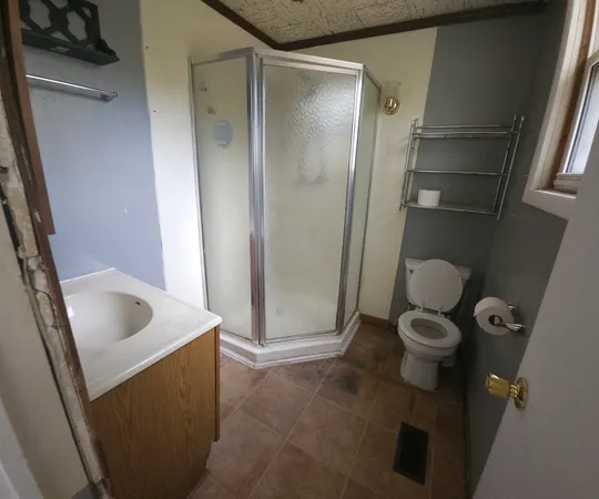 a bathroom with a sink and mirror