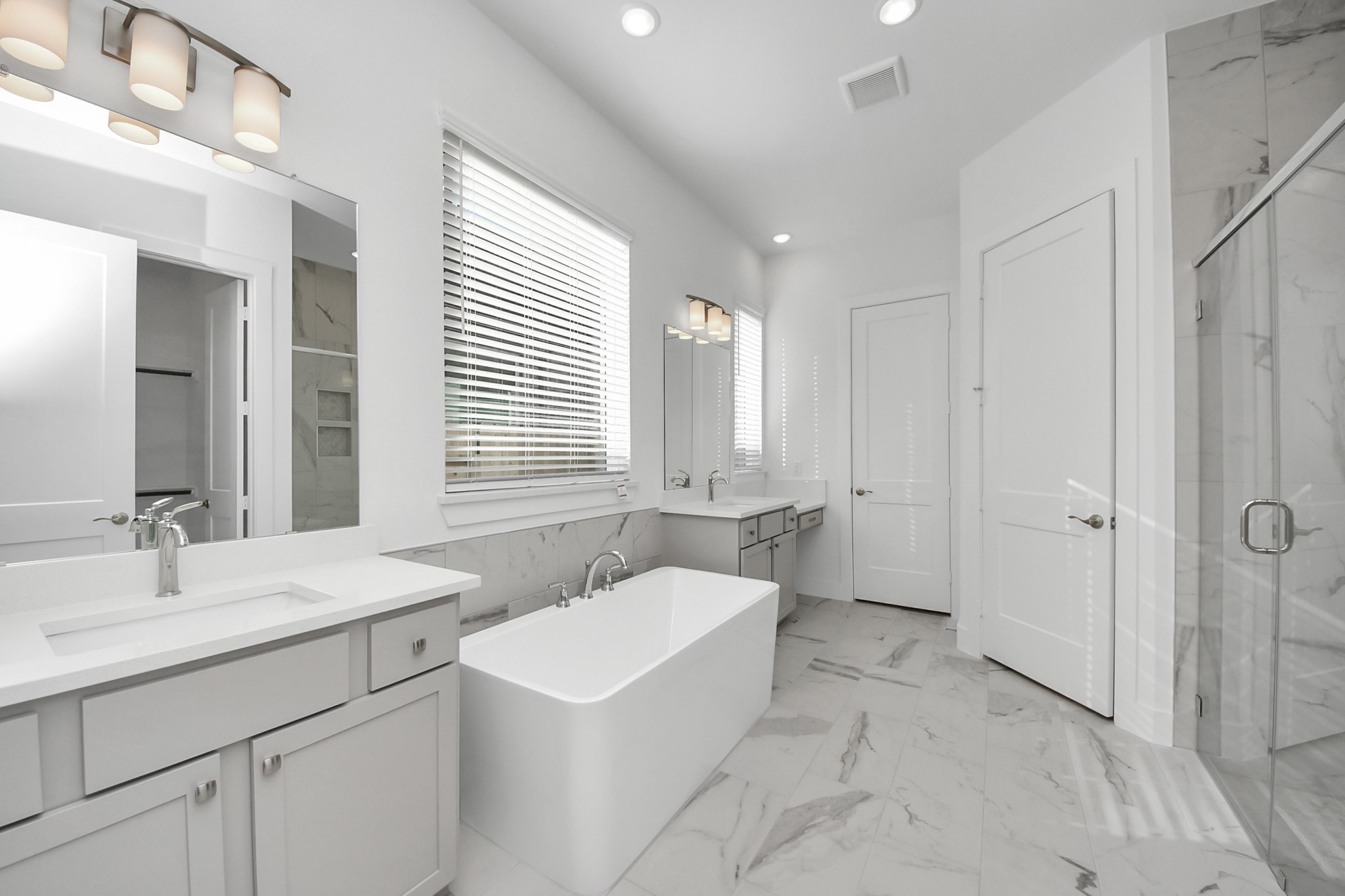 9507 Chateau Hill Manvel, TX 77578 - Photo 11 of 32 a bathroom with a sink and a mirror