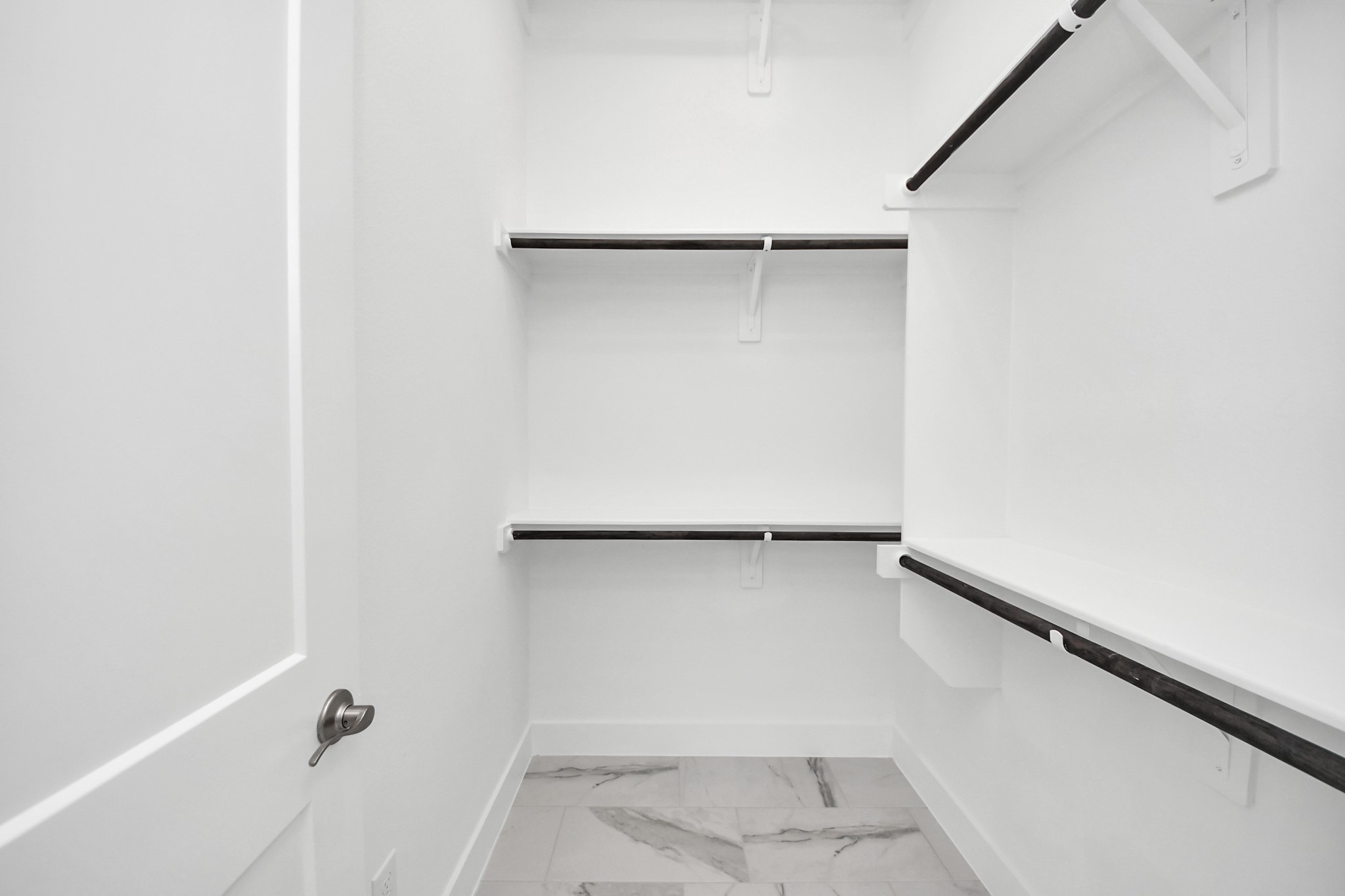 9507 Chateau Hill Manvel, TX 77578 - Photo 14 of 32 a view of an empty walk in closet