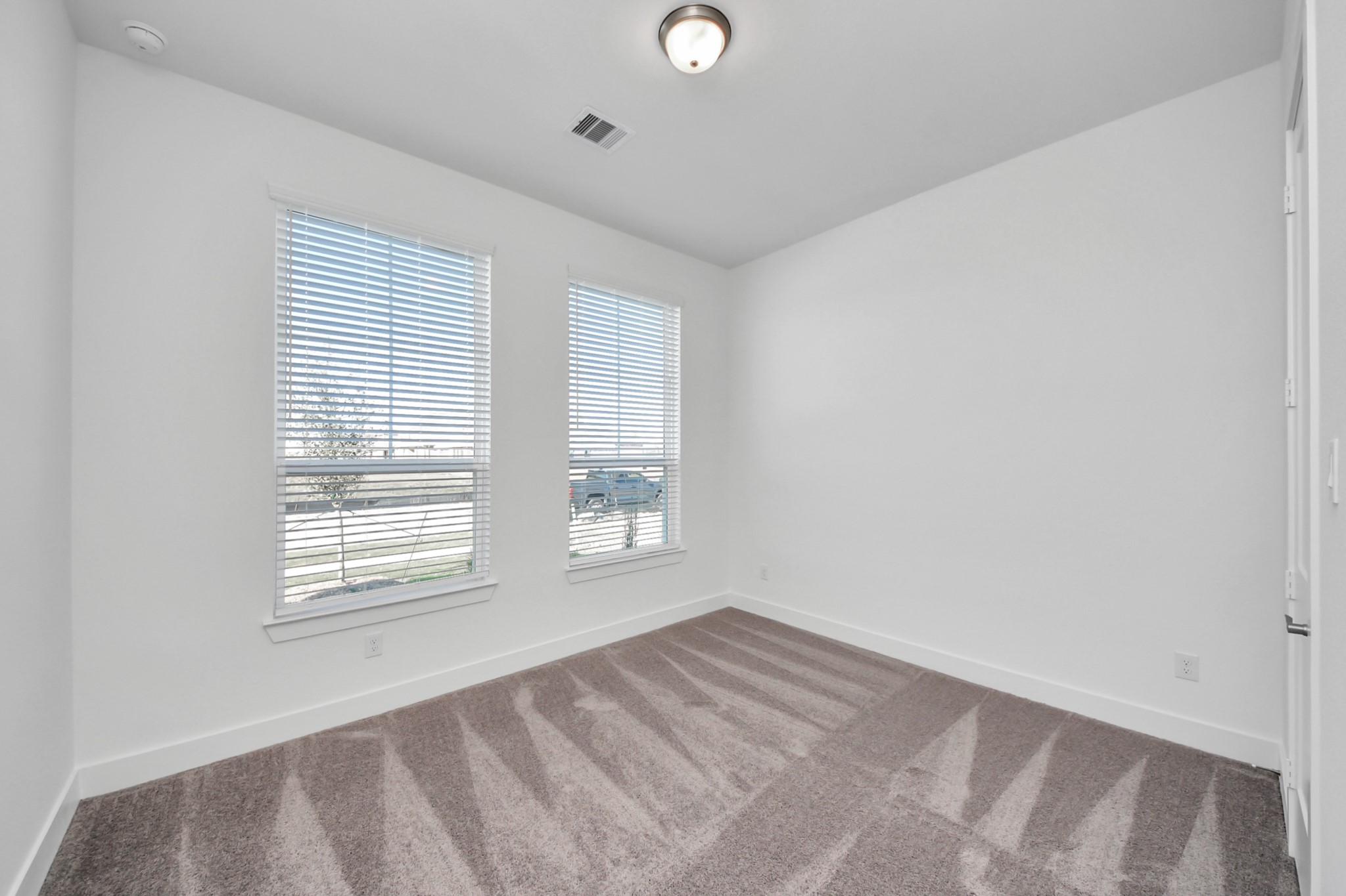 9507 Chateau Hill Manvel, TX 77578 - Photo 16 of 32 a view of an empty room with a window