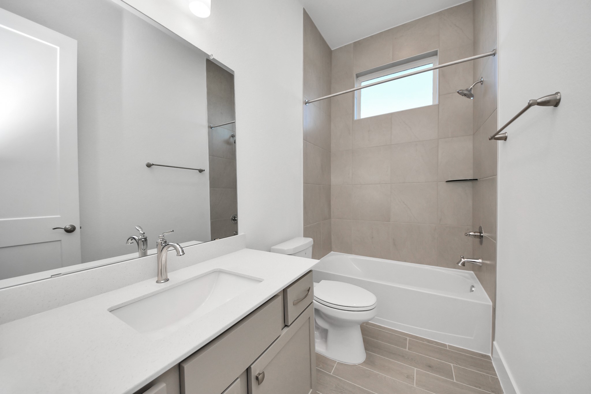 9507 Chateau Hill Manvel, TX 77578 - Photo 17 of 32 a bathroom with a sink toilet and shower