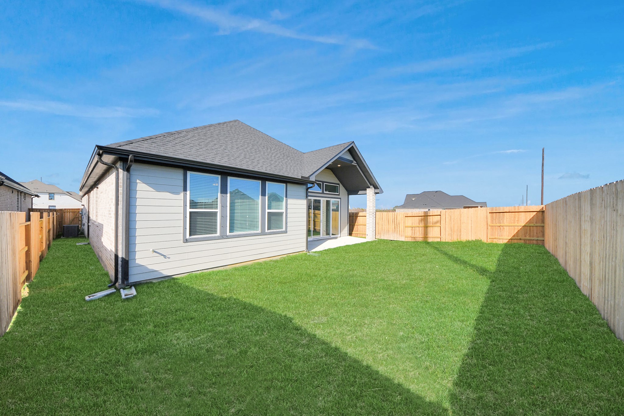 9507 Chateau Hill Manvel, TX 77578 - Photo 20 of 32 a house view with a garden space
