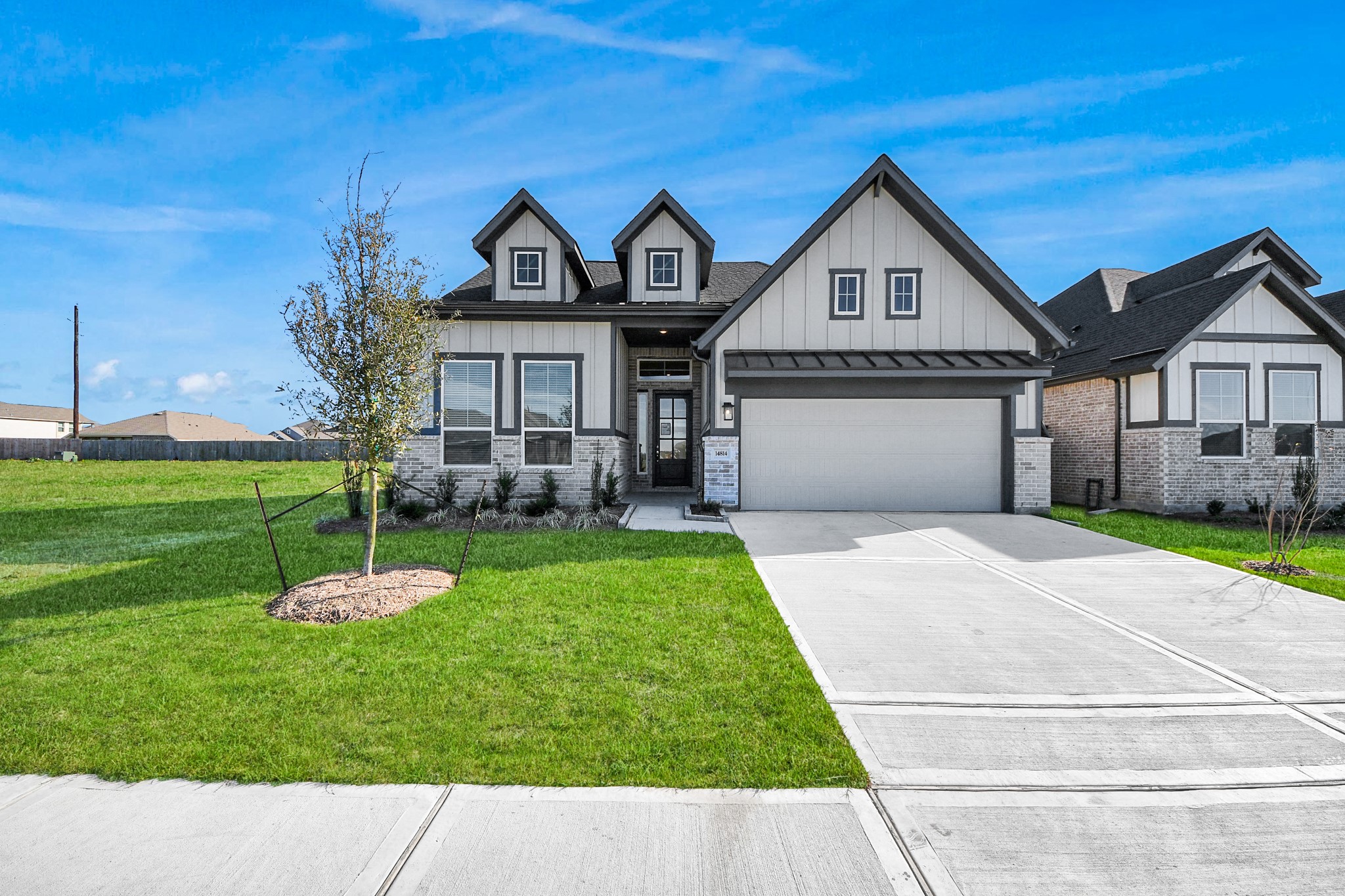 9507 Chateau Hill Manvel, TX 77578 - Photo 22 of 32 a front view of a house with a yard