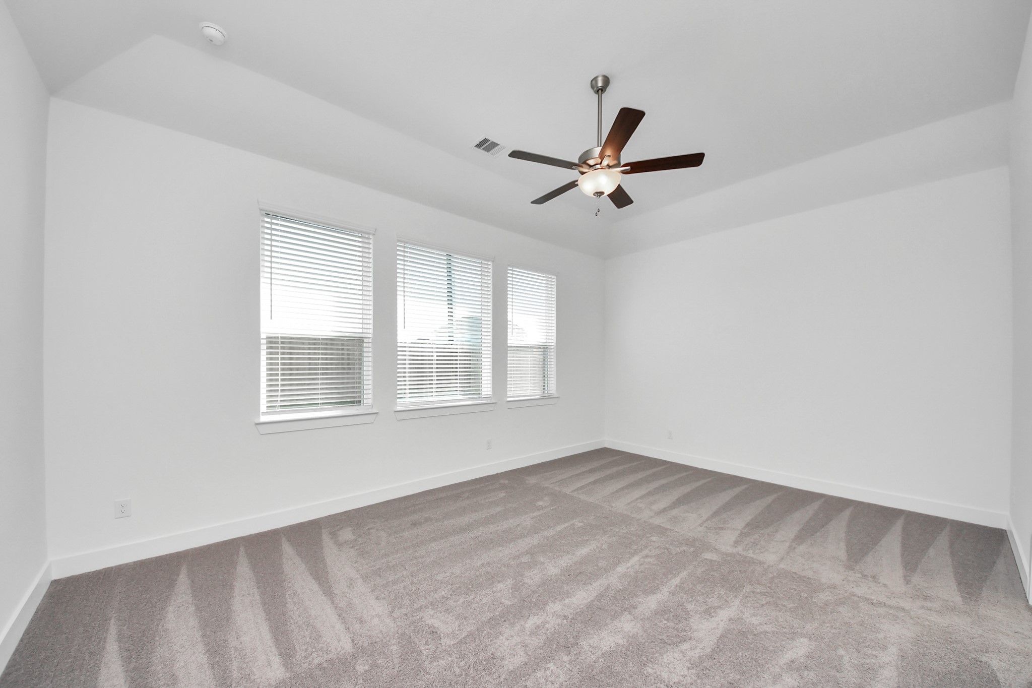 9507 Chateau Hill Manvel, TX 77578 - Photo 10 of 32 a view of an empty room with a window