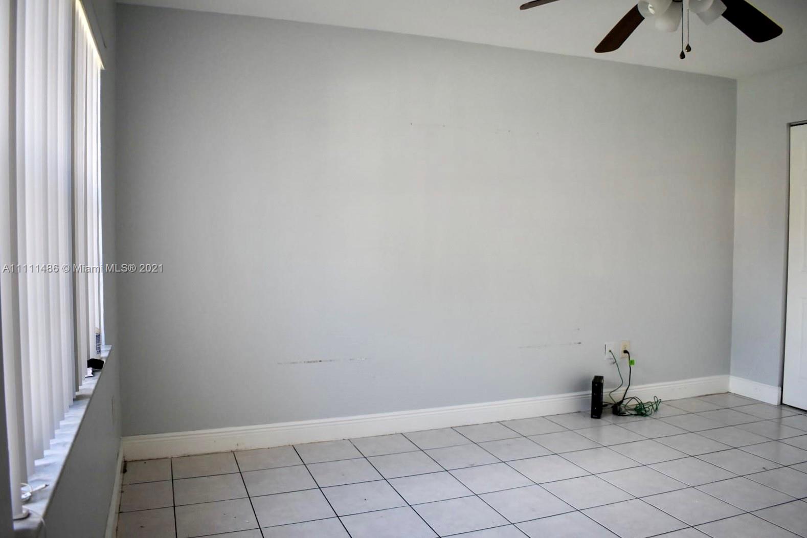18280 Mediterranean Boulevard, Unit 43 Hialeah, FL 33015 - Photo 16 of 28 a view of an empty room