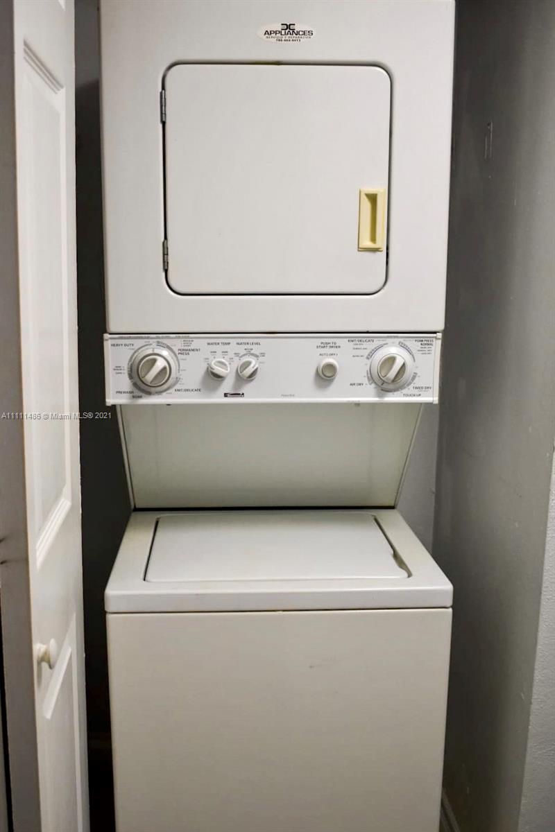 18280 Mediterranean Boulevard, Unit 43 Hialeah, FL 33015 - Photo 27 of 28 a close up view of washer and dryer