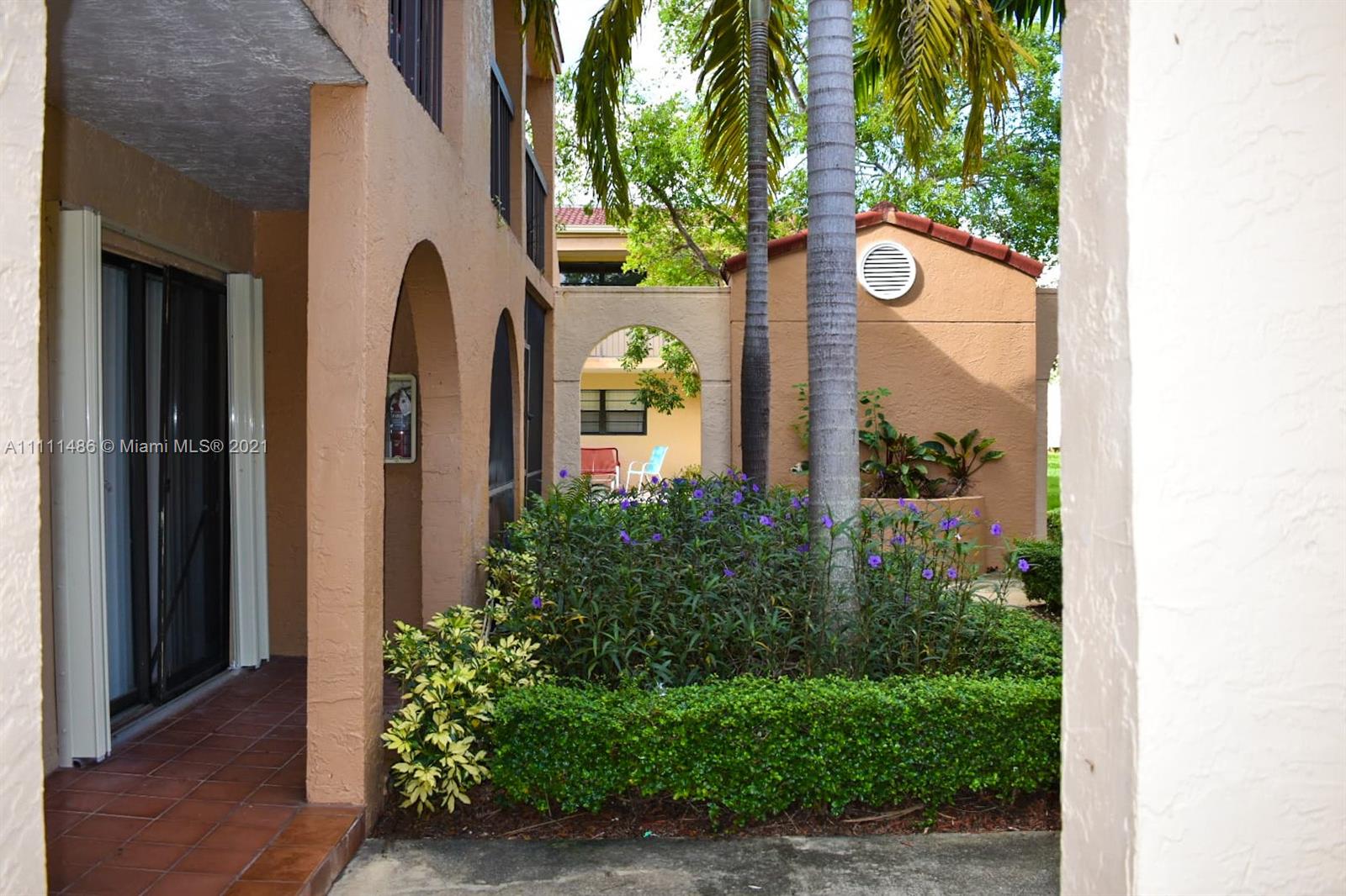 18280 Mediterranean Boulevard, Unit 43 Hialeah, FL 33015 - Photo 5 of 28 a sign that is on the side of a building