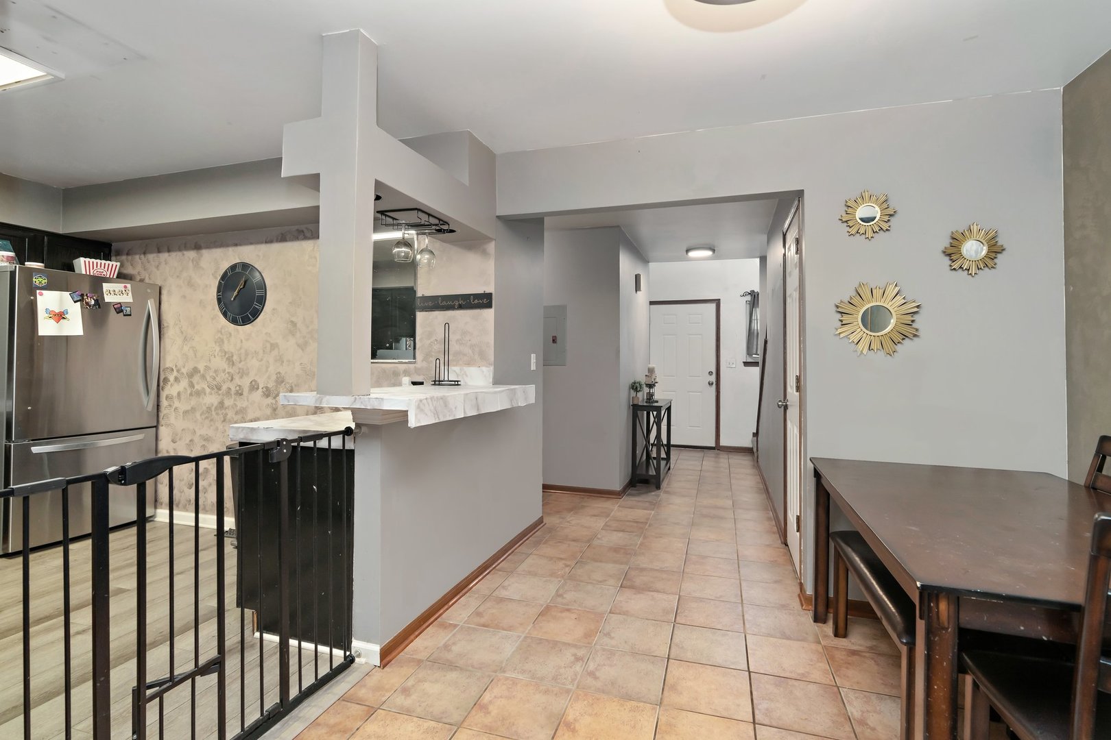 709 Meadows Boulevard Addison, IL 60101 - Photo 4 of 22 a bathroom with a sink a mirror and a shower