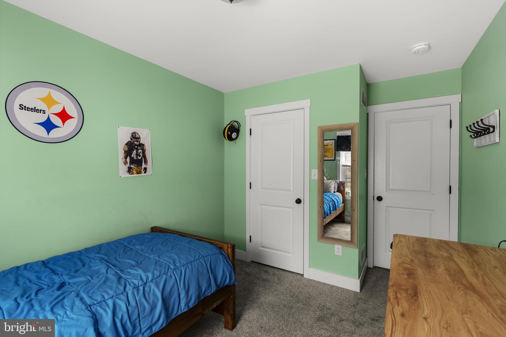 744 Lime Quarry Road Gap, PA 17527 - Photo 53 of 76 a bedroom with a bed and painting on the wall