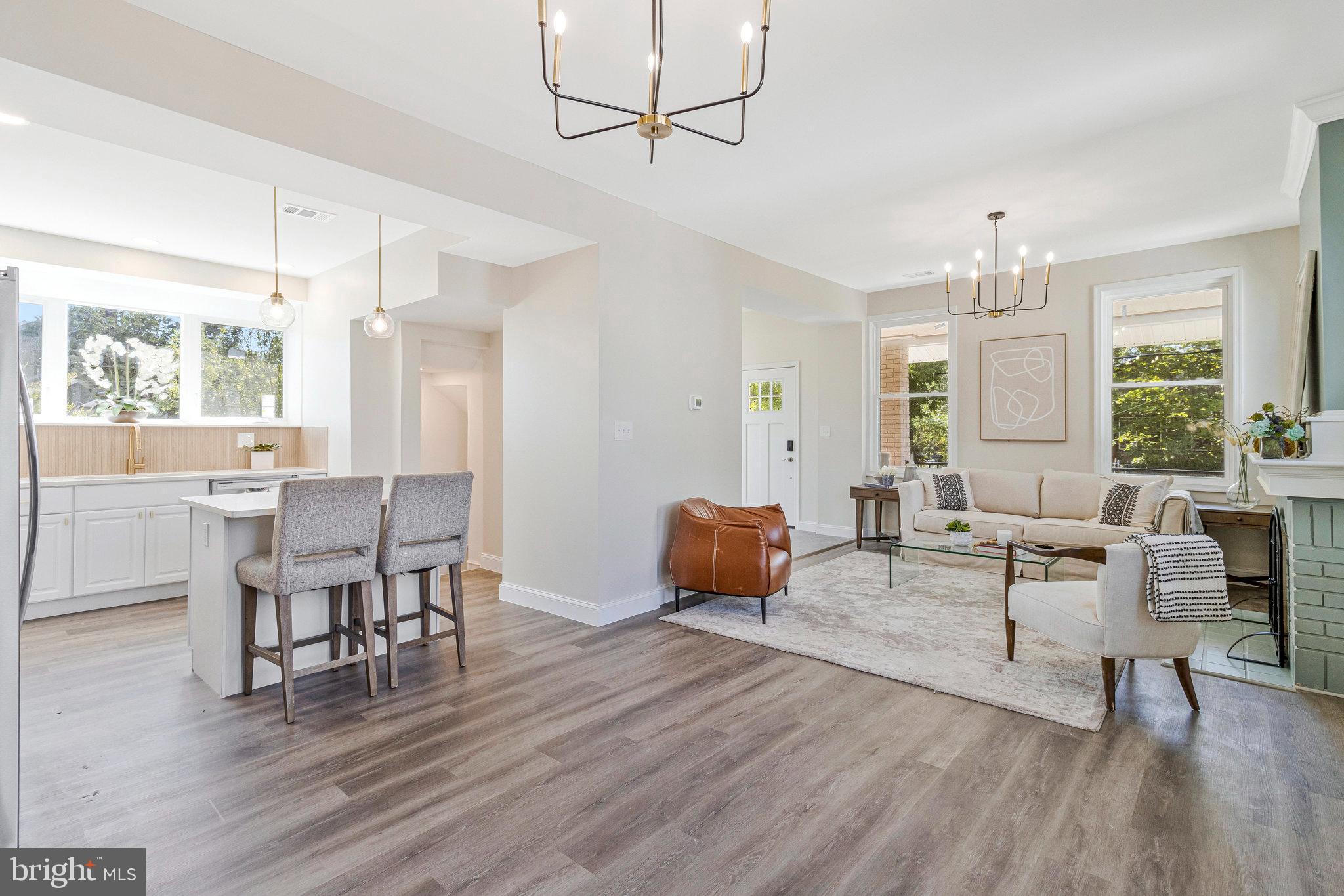 2140 32nd Street Southeast Washington, DC 20020 - Photo 15 of 50 a living room with furniture dining table and wooden floor