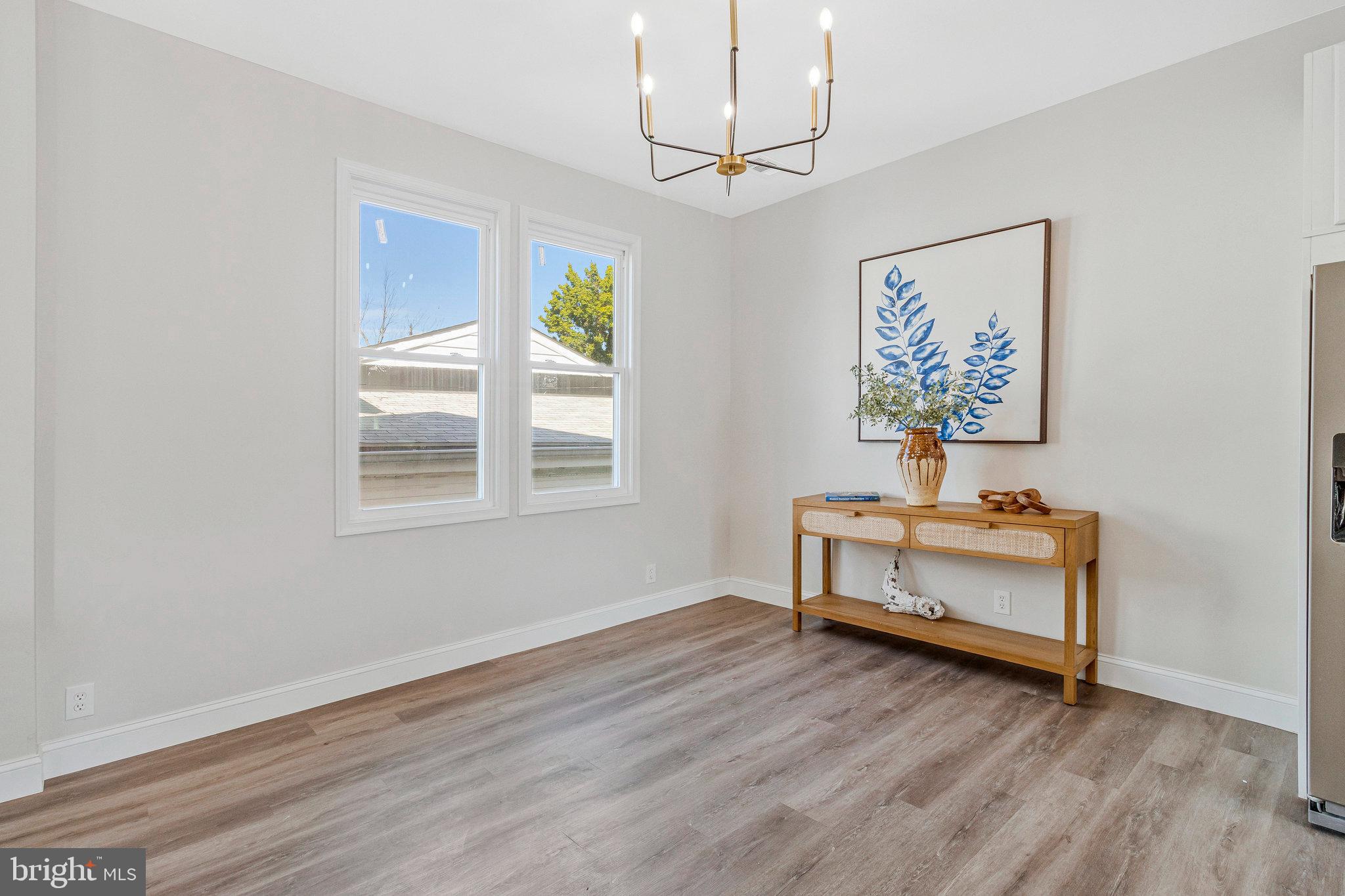 2140 32nd Street Southeast Washington, DC 20020 - Photo 16 of 50 a view of room with furniture and wooden floor