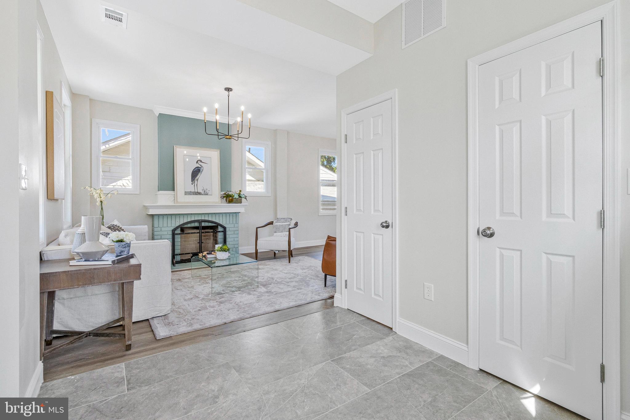 2140 32nd Street Southeast Washington, DC 20020 - Photo 22 of 50 a living room with furniture and a fireplace