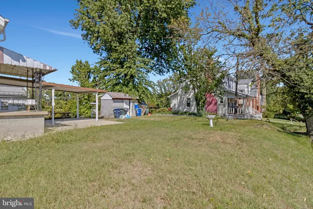 a bathroom with a shower and a sink