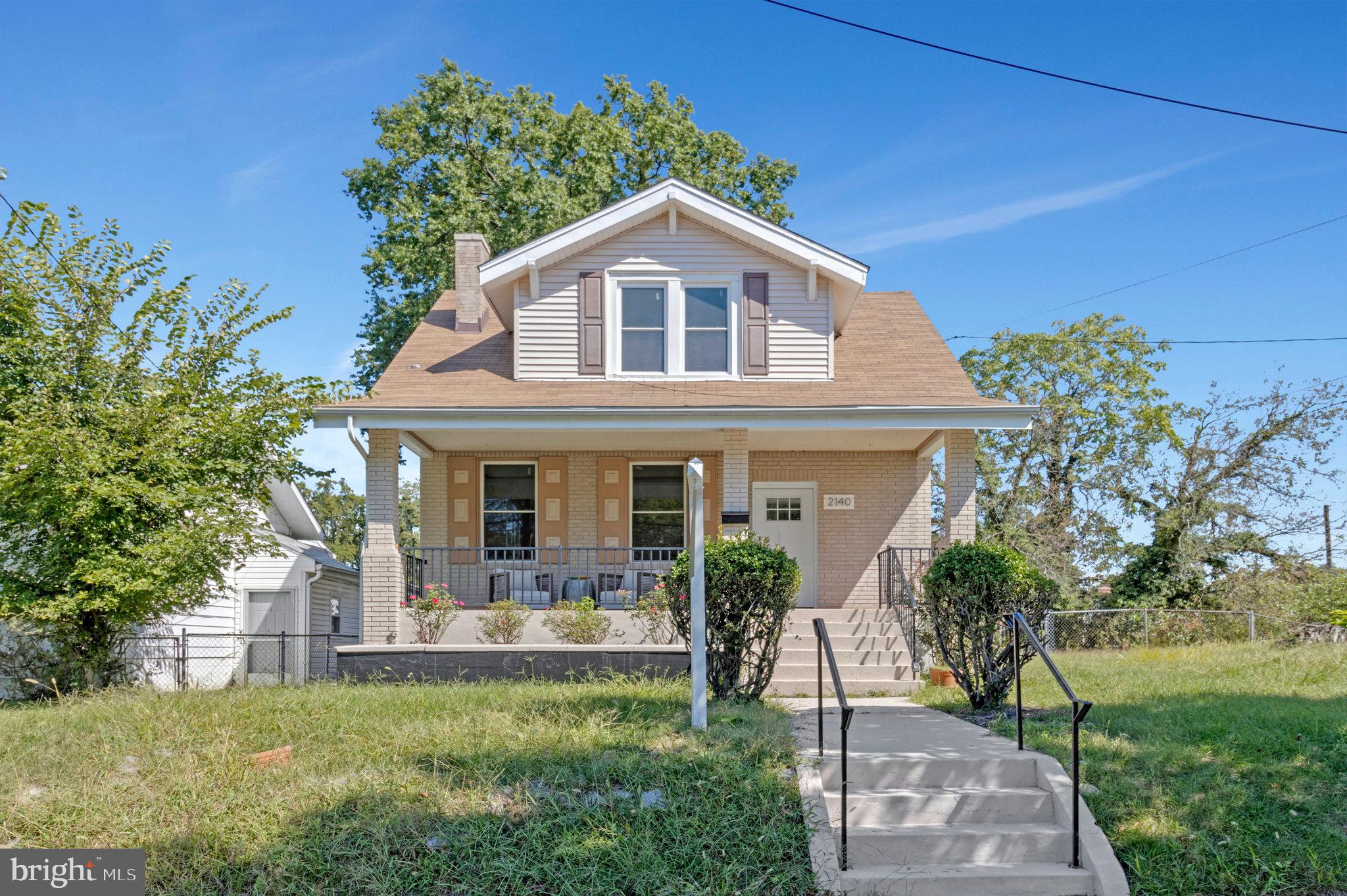 2140 32nd Street Southeast Washington, DC 20020 - Photo 5 of 50 a view of a house with a yard