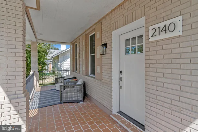 a view of a porch with furniture
